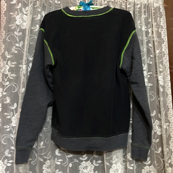 Extra small fits more like a small Victoria’s Secret pull over black and green - Picture 3 of 3